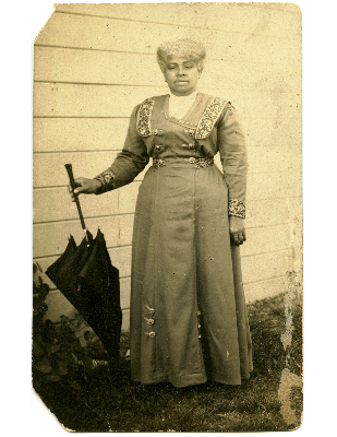 Portrait of Mayme Mary C. Netherland holding an umbrella