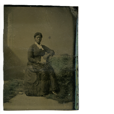 Portrait of a woman posed with a book