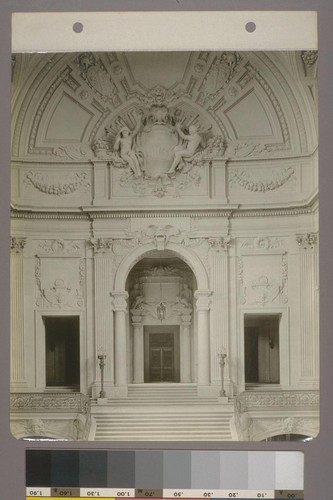 [Rotunda, showing upper landing of grand staircase and sculptural figures. Entrance to Board of Supervisors' chambers in distance.]