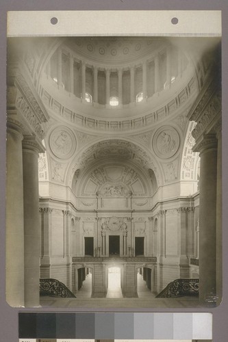 [Rotunda from upper landing of grand staircase, showng clock, arches, upper gallery, and dome.]