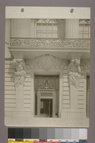 [Doorway with sculptural figures, west facade.]