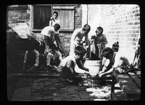 Boys washing laundry, China, ca. 1920-1940