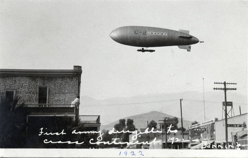 Army dirigible flying over downtown Banning, California