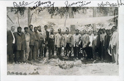 Large group of men at Father Benedict Florian Hahn's burial at the St. Boniface cemetery