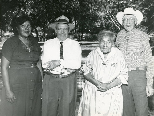 Four individuals at a Pioneer Picnic in Banning, California, including Bert and George Bailiff
