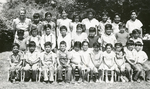 Susan B. Coombs posing with her class from the Eastside School in Banning, California