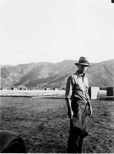 George Barker at work in dry yard of the Barker Ranch in Banning, California