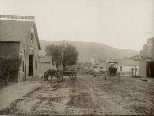 Early downtown Banning, California street lined with businesses