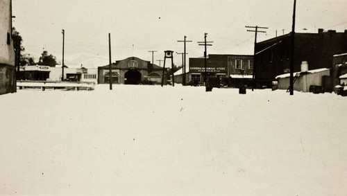 Downtown Banning, California looking north toward Ramsey Street during snowstorm in early 1900s
