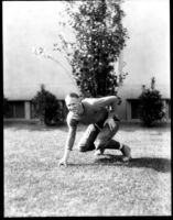 Football player posing, c.1928