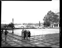 Snowfall on campus - Female students on Esplanade, 1949