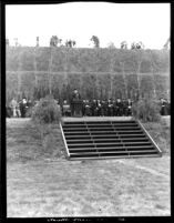 Commencement - Speaker at podium with seated faculty, c.1941