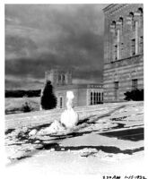 Snowfall on campus - Snowman in front of Education Building (Moore Hall), 1932