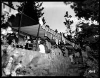 Alumni event at Lake Arrowhead - Drinks on the porch, 1944