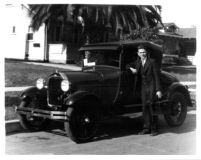 Thelner Hoover with automobile, c.1930