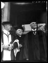 Dedication ceremony - Participants in regalia exiting Royce Hall, 1930