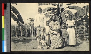 Christian family sitting outdoors, Congo, ca.1920-1940