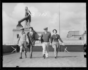 Four people in outing clothes, Southern California, 1932