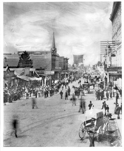 View of a celebration on Spring Street, taken looking south from First Street, ca.1888