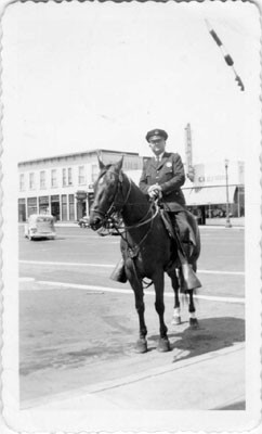 [Mounted police officer Ed Cassidy in Visitacion Valley]