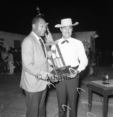 Bradley awarding trophy, Los Angeles, 1967