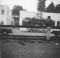 Removing the railroad tracks on Miller Ave., circa 1955