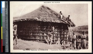 Indigenous men building a house for a missionary, Ethiopia, ca.1900-1930
