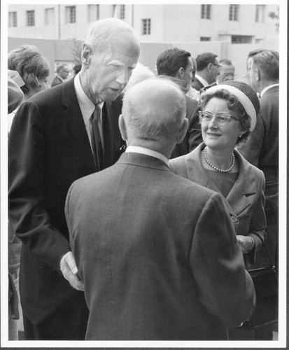 1964 Picture of Leavey Conversing with People