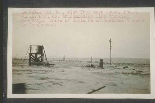 La Belle Oil Company, view from mess house, south, S.J.L.&P.; Company transmission line crossing property. Wells of Santa Fe on Sections four and nine in foreground