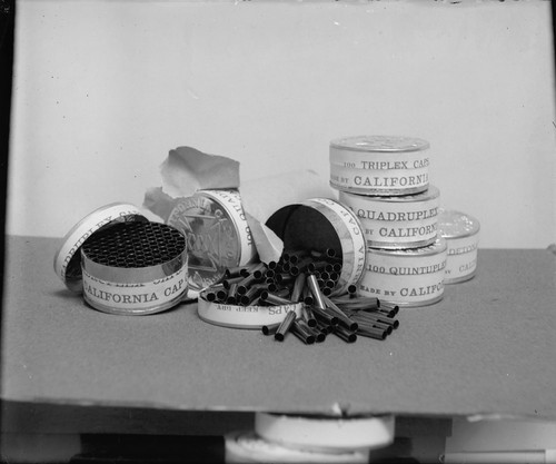 Triplex caps and storage tins, California Cap Company. [negative]