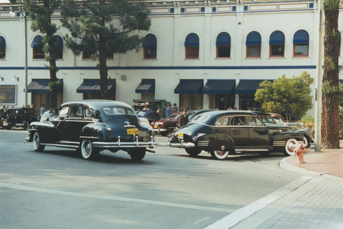 Plaza Square with classic cars used in feature film, "The Man Who Wasn't There", Orange, California, 2000