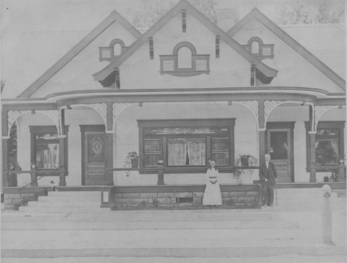 Lewis and Persis Ainsworth in front of their house, Orange, California, ca. 1911