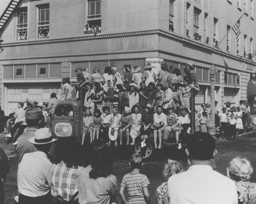 Parade float truck in Plaza Square, Orange, California, ca. 1950