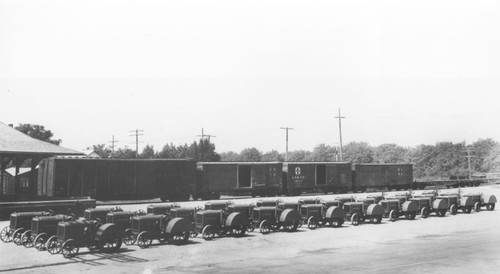 Santa Fe Depot with shipment of tractors for the M. Eltiste Company, Orange, California, 1922