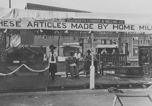 1910 Street Fair, Ainsworth Lumber & Milling Company booth, Orange, California