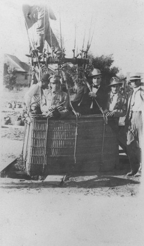 1910 Street Fair with group in balloon ascension ride, Orange, California