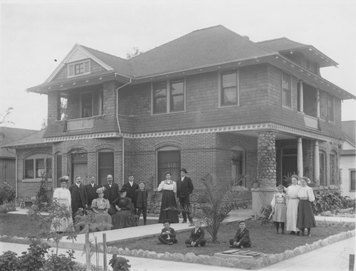 Louis Gunther family gathered outside home at 206 W. Almond Avenue at Olive, ca. 1908