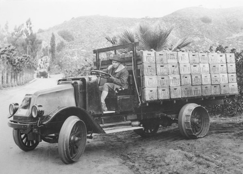 Irvine Valencia Orange Growers Association truck with orange crates, Orange, California, ca. 1915-1923