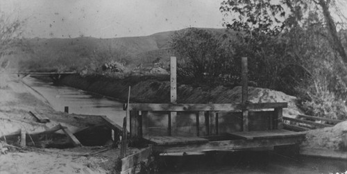 Irrigation ditch and sluice, Orange, California, ca. 1910