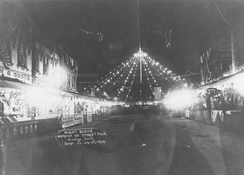 1910 Street Fair, night scene on South Glassell Street, Orange, California