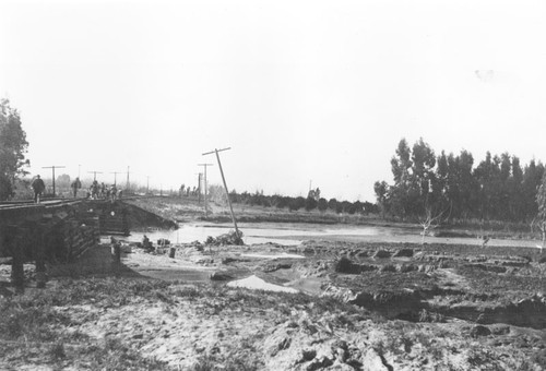 1916 flood, Santa Fe Railroad tracks and bridge, Orange, California