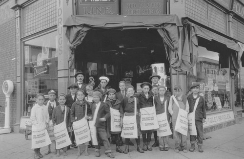 Adolph Dittmer and his delivery crew outside the Dittmer's Mission Pharmacy in Orange, California, ca. 1920