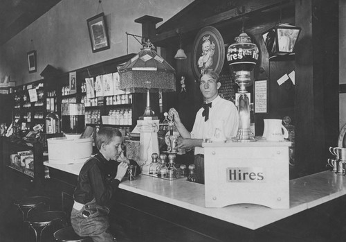 Dittmer's Mission Pharmacy interior with soda fountain, located on South Glassell Street, Orange, California, 1905