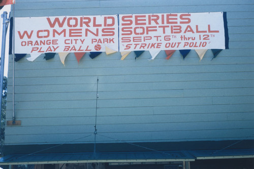 Orange Lionettes women's softball game banner in Orange City Park, Orange, California, 1954