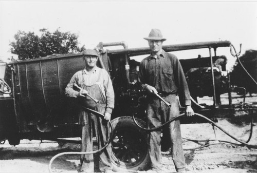 Orchard spray rig and workers, Orange, California, 1929