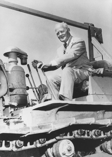 Edwin F. Gould on bulldozer breaking ground for Anaconda Wire and Cable building, Orange, California, 1953-1954