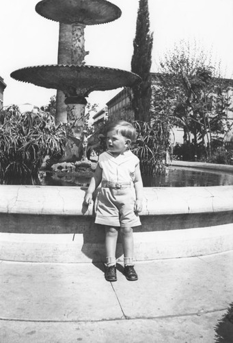 Wayne Scott Davis by fountain in Plaza Park, Orange, California, 1932