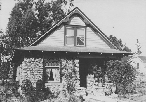 Mrs. Wilhelmina Gunther stands outside her home at 227 W. Almond Avenue, Orange, California, ca. 1912