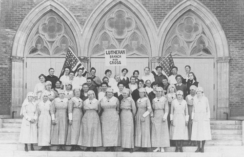 Lutheran Branch Red Cross group portrait on the steps of St. John's Evangelical Lutheran Church, Orange, California, ca. 1917