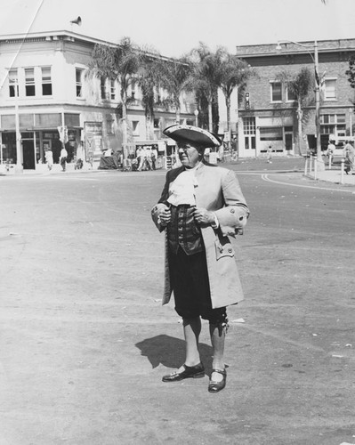 Unidentified man in American Revolutionary parade costume, Orange, California, ca. 1960